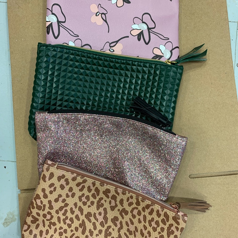 Set of 4 Ipsy makeup bags. 7” wide. 5” tall.
